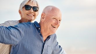 Two smiling older adults.
